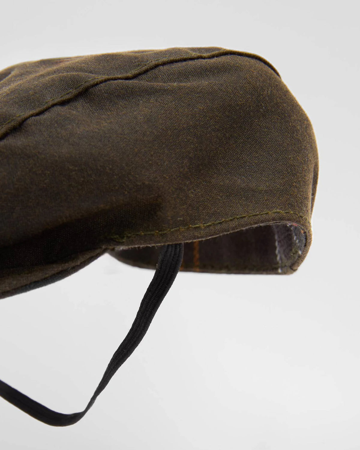 Casquette plate pour chien Barbour Wax Olive