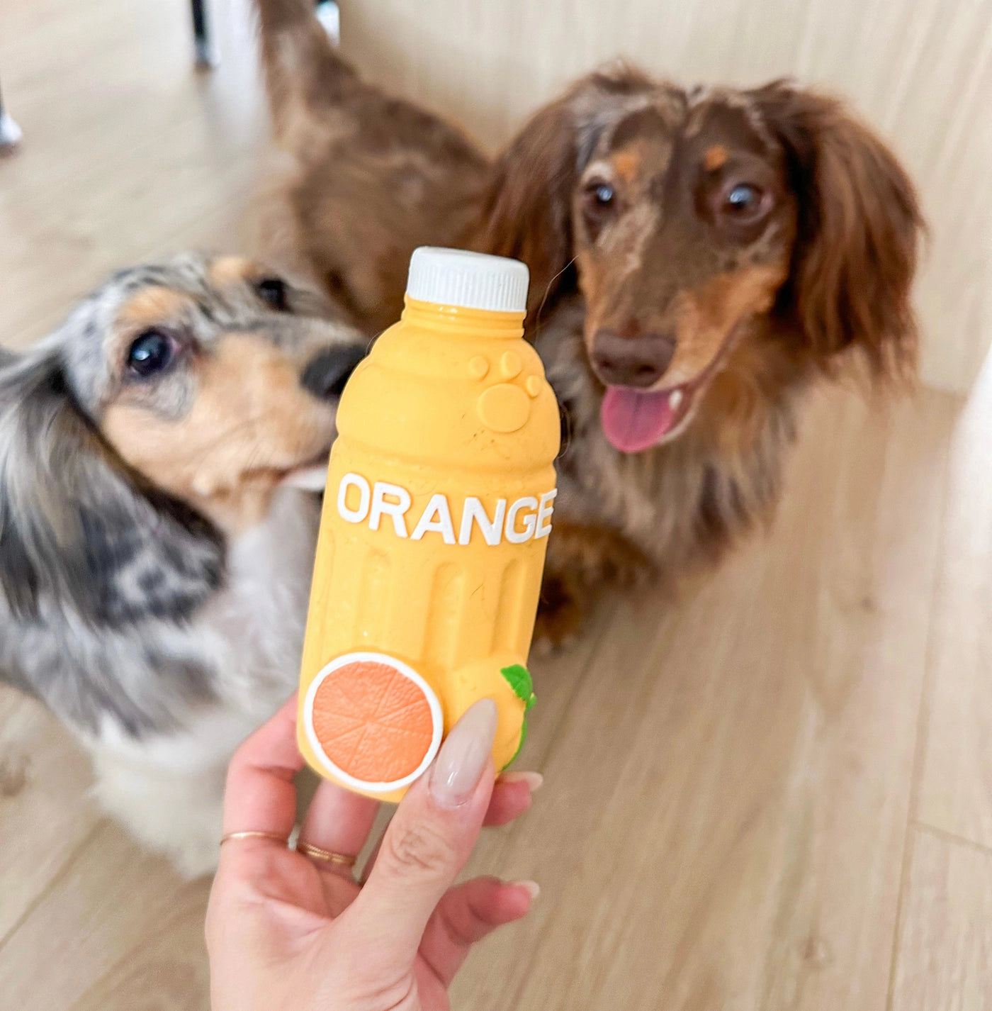 Jouet en caoutchouc jus d'orange